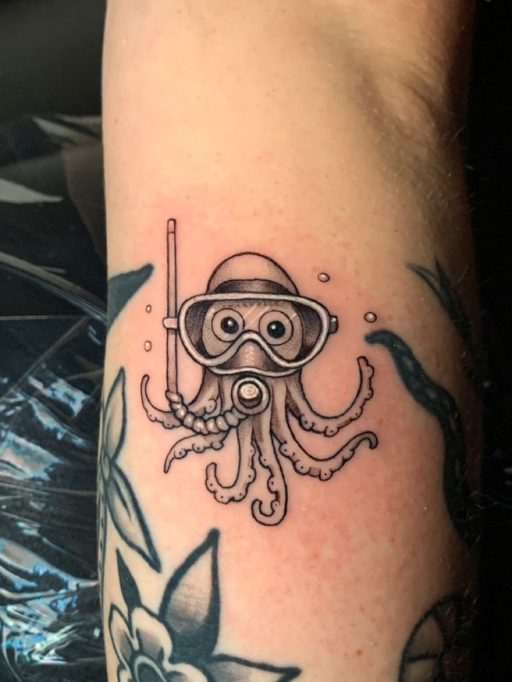 Snorkeling tattoo, octopus tattoo, sea creature tattoo Kracken Tattoo For Women, Tattoo Ideas Octopus, Small Tattoos Octopus, Octopus Tattoos Simple, Simple Octopus Tattoo, Octopus Couples Tattoo, Snorkel Tattoo, Cute Ocean Tattoos, Baby Octopus Tattoo