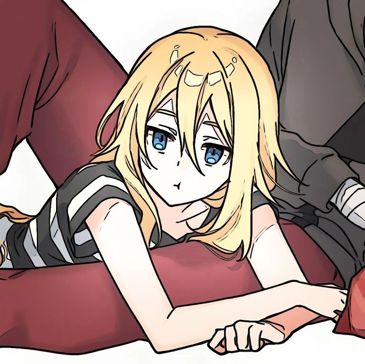 an anime character laying on the ground next to another character with blue eyes and blonde hair