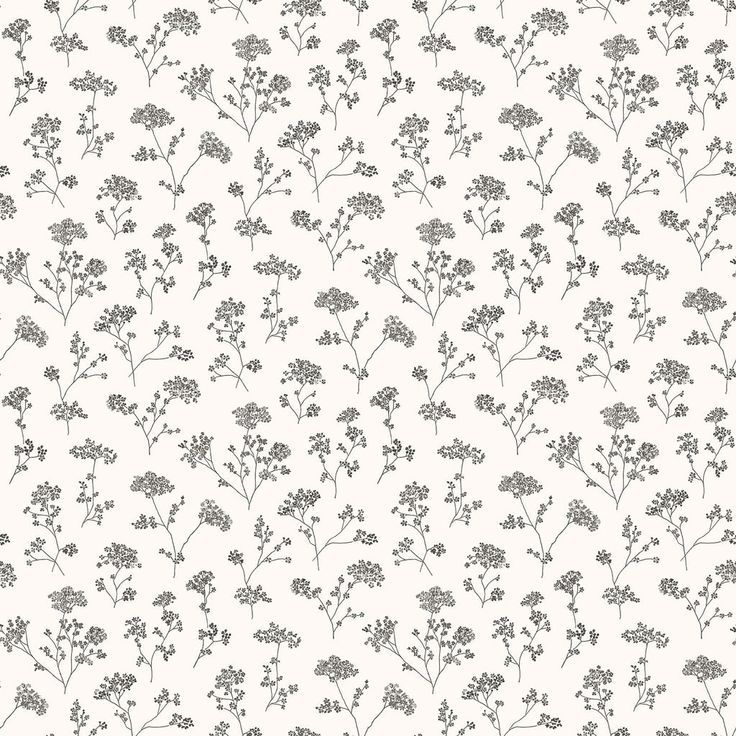 a white and gray floral wallpaper with small grey flowers on the left hand side