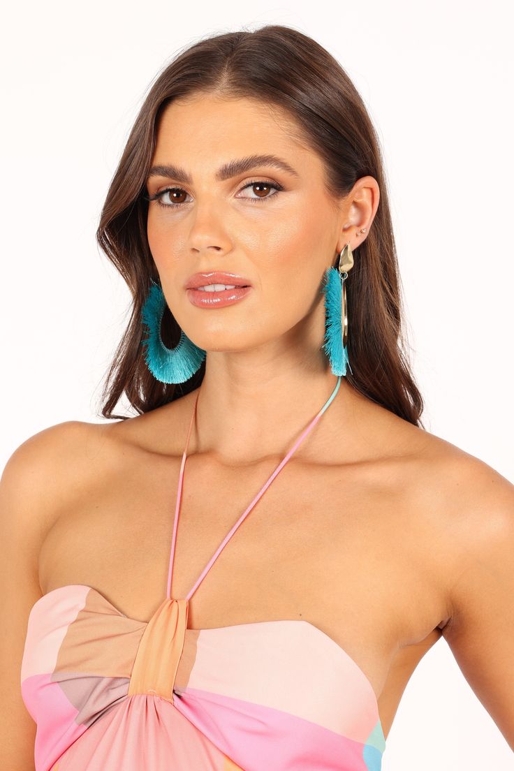 DETAILS    Glam up any look with these stunning teal statement earrings! Adorned with delicate tassel fringe detail, these beauties will catch the eye of everyone around you.   teal statement earring  tassel fringe detail  push back closure  material - 20% alloy / 80% cotton    MEASUREMENTS    length - 3.5"  width - 3" Satin Dresses Long, Satin Dresses Long Sleeve, Spring Wedding Guest, Winter Wedding Guests, Black Tie Wedding Guests, White Dress Shoes, Essential Dress, Resort Dresses, Statement Earring