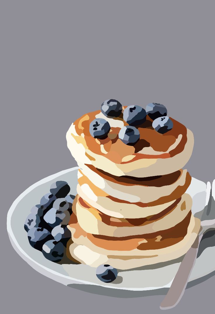 a stack of pancakes on a plate with blueberries