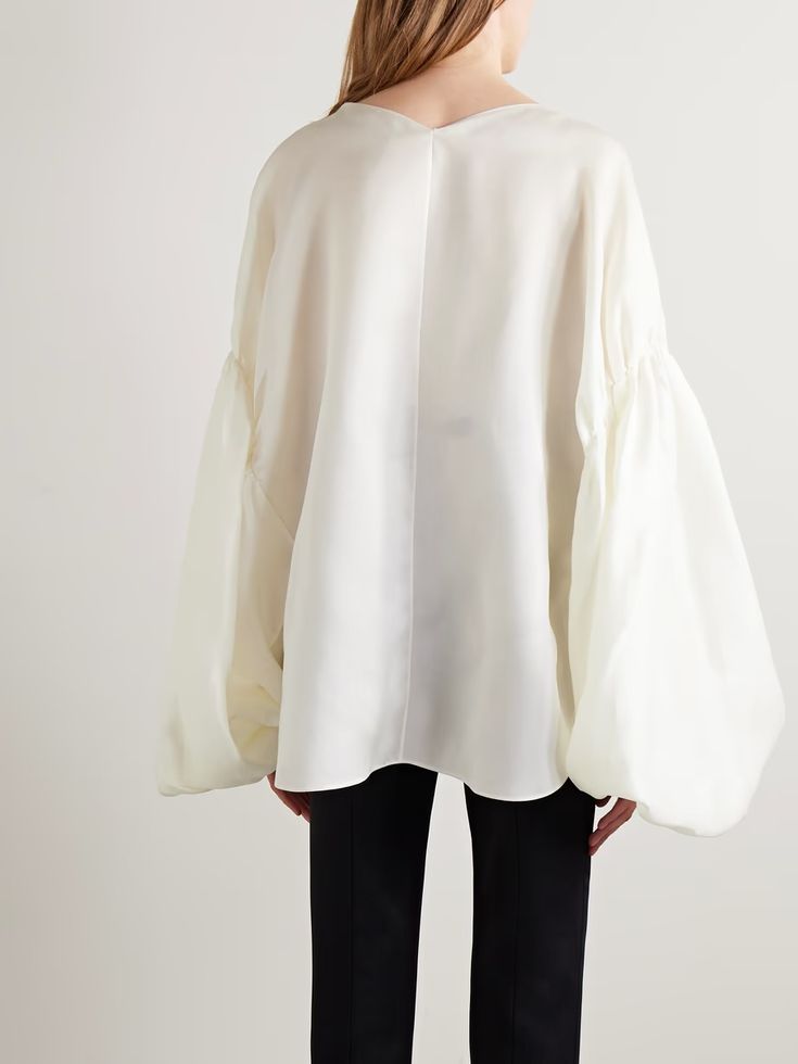 KHAITE Quico oversized silk blouse | NET-A-PORTER Silk Top Outfit Classy, Silk Top Outfit, White Silk Blouse, Silky Shirt, Oversized Tops, Edgy Chic, Silk Slip, White Silk, Tops For Women