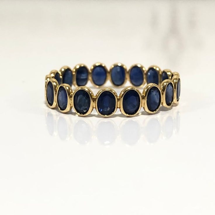 Solid 18K Gold Ring Natural Blue Sapphire Ring Band Full Eternity Band Stackable Ring Minimalist Ring, Wedding Band, Gift for Her - Etsy Philippines Wedding Band Gemstone, Gemstone Eternity Ring, Birth Stone Ring Designs, Elegant Blue Jewelry With Smooth Bezel, Yellow Gold Sapphire Stackable Rings With Bezel Setting, Elegant Sapphire Stackable Eternity Band, Sapphire Wedding Ring With Smooth Bezel, Wedding Sapphire Ring With Smooth Bezel, Sapphire Ring With Smooth Bezel For Wedding