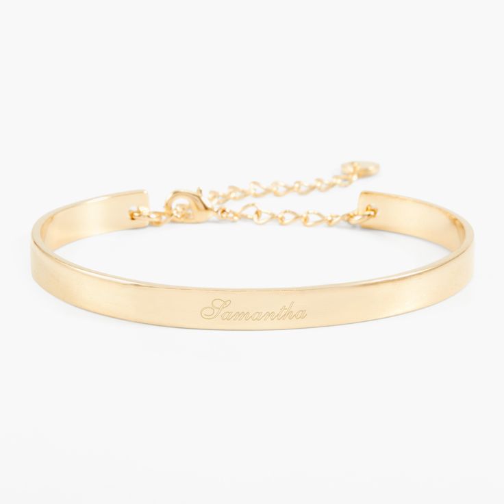 Simple yet sophisticated, the elegance of the Gwen Cuff Bracelet makes it an instant classic. Personalize it with your name or the name of a loved one in your choice of engraving styles. Available in 14k gold plated, rhodium plated or 14k rose gold plated brass Width: 1/4" Length: 5 1/2" Made in the USA With engraving this item is FINAL SALE SKU: BYB1031 Classic Customizable Jewelry For Personalized Gifts, Classic Gold Stainless Steel Cuff Bracelet, Classic Personalized Bracelet, Elegant Personalized Name Bracelet As Gift, Adjustable Classic Gold Bracelet For Anniversary, Classic Bracelets For Personalized Gift, Elegant Customizable Bracelets As Personalized Gifts, Elegant Customizable Bracelets For Personalized Gifts, Classic Name Bracelet For Personalized Gift