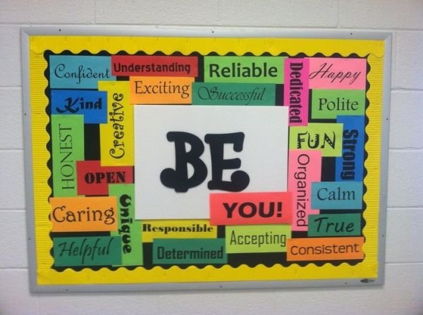 a bulletin board with words written in different languages on it and the word be you