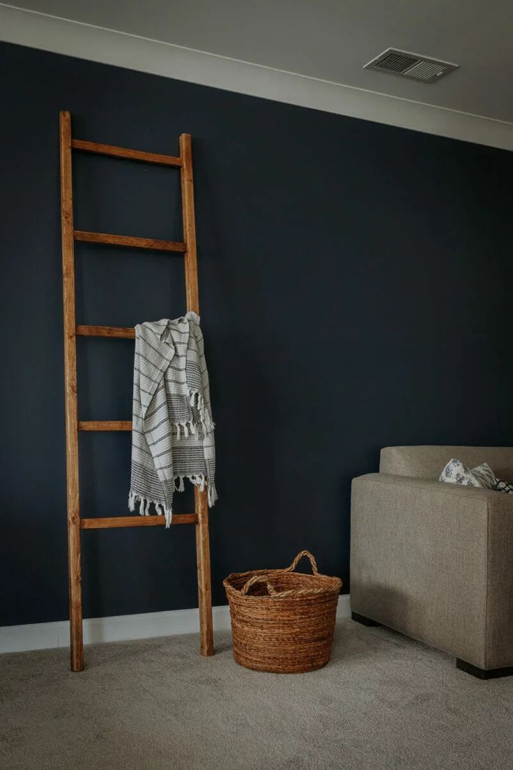 a ladder leaning against a wall in a living room