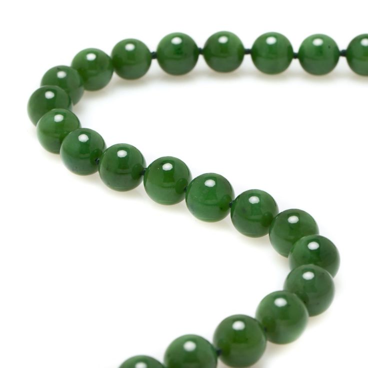 Since 1861, Gump's has been a destination for jewelry that is distinctive, extraordinary and timeless — and our jade collection is no exception. Once considered more precious than gold, jade has been more highly prized in Asia than any other gemstone. Treasured for thousands of years, it represents harmony, balance and protection, and is thought to bring good luck to the wearer. Green nephrite jade, 12mm. Diamonds, 0.06ctw. 18-karat yellow gold. 17"L. Nephrite Jade, Jade Necklace, Jade Beads, Silk Thread, Good Luck, Jade, Gold Necklace, Beaded Bracelets, Gems