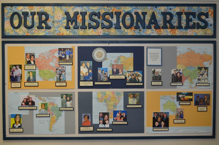 a bulletin board with pictures and words on it that says our missionariess in different languages