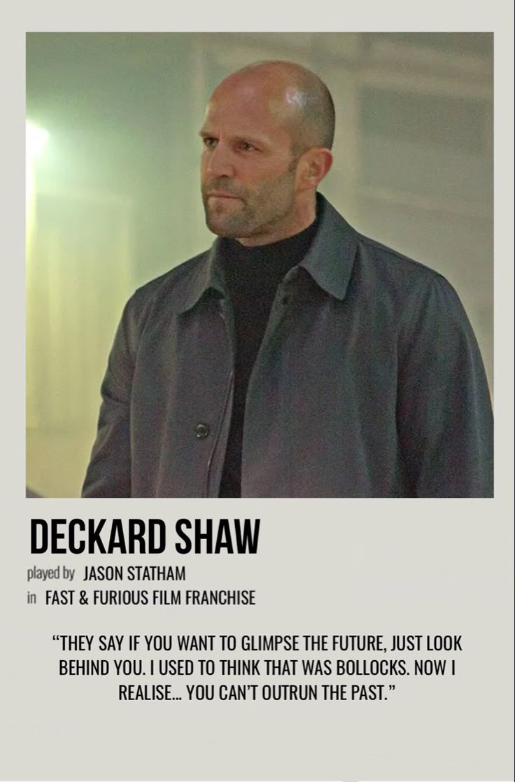 a man standing in front of a poster with the caption'deccard shaw '