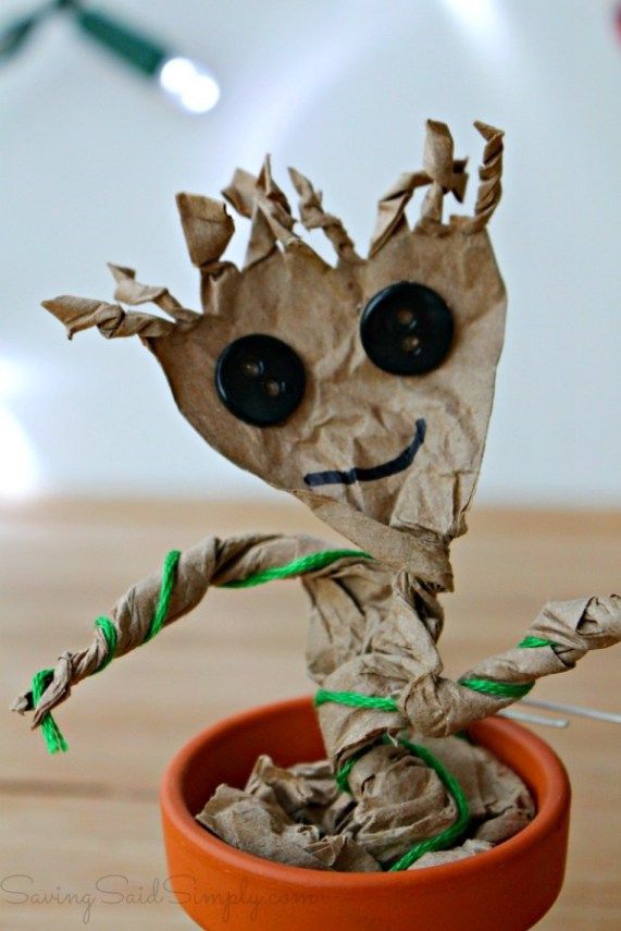 a paper bag groote is sitting in a pot