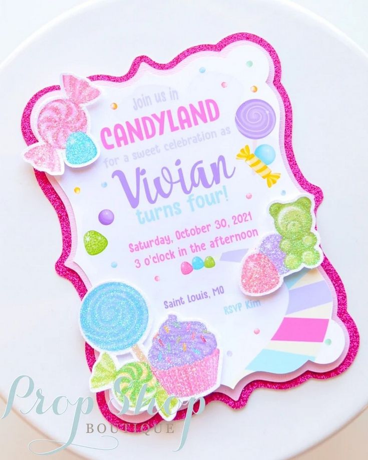 a candy themed birthday party sign on a plate