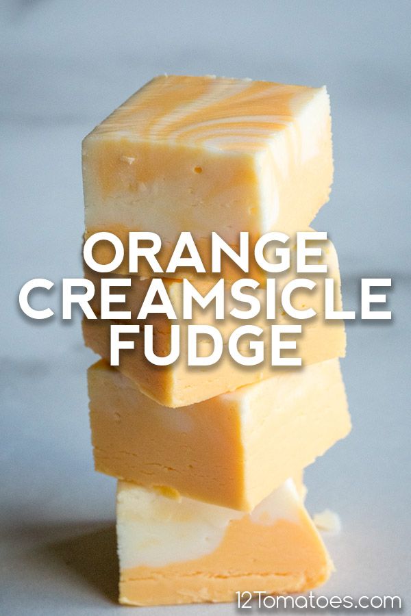 orange creamsicle fudge is stacked on top of each other with the words, orange creamsicle fudge