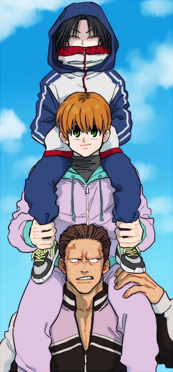 two people sitting on top of each other in front of a blue sky with clouds