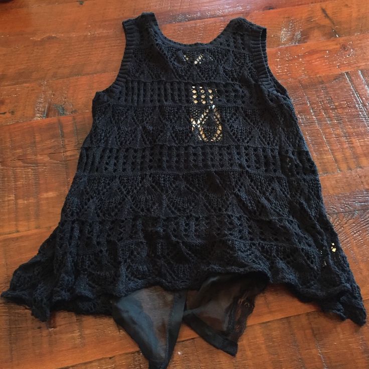 Unique Black Crotchet Tank With Sheer Black Material And Buttons Down The Back. Flowy, Looser Fit. Brand Is Rewind. Would Look Great With A Pair Of Jeans, A Tank Underneath, And Booties! Never Worn. New With Tags. Chic Black Crochet Top For Beach, Black Bohemian Lace Top, Casual Black Crochet Trim Top, Black Open Knit Crochet Top For Vacation, Black Crochet Casual Tops, Casual Black Crochet Tops, Black Crochet Lace Tops For Vacation, Black Crochet Top For Spring Layering, Casual Black Lace Top