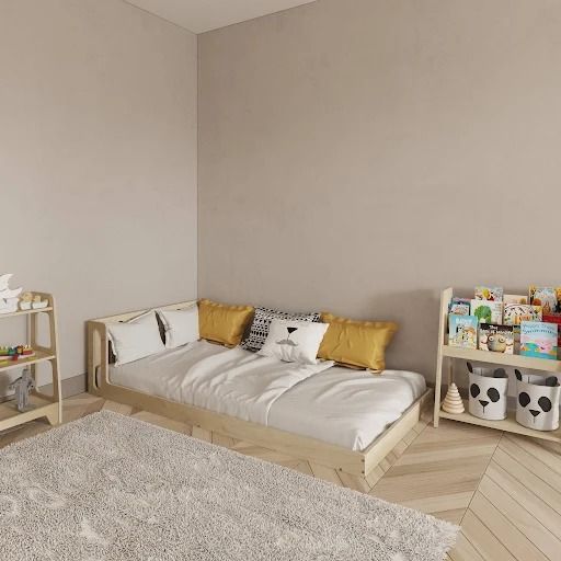 a child's room with a bed, bookshelf and toys on the floor