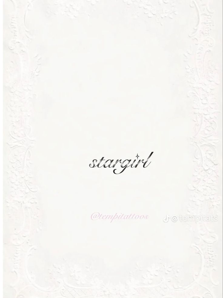 a white card with the word stargirl written in cursive writing on it