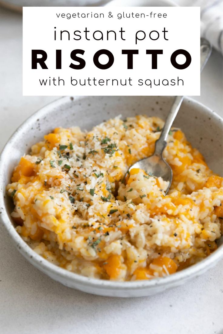 a white bowl filled with risotto and topped with cheese