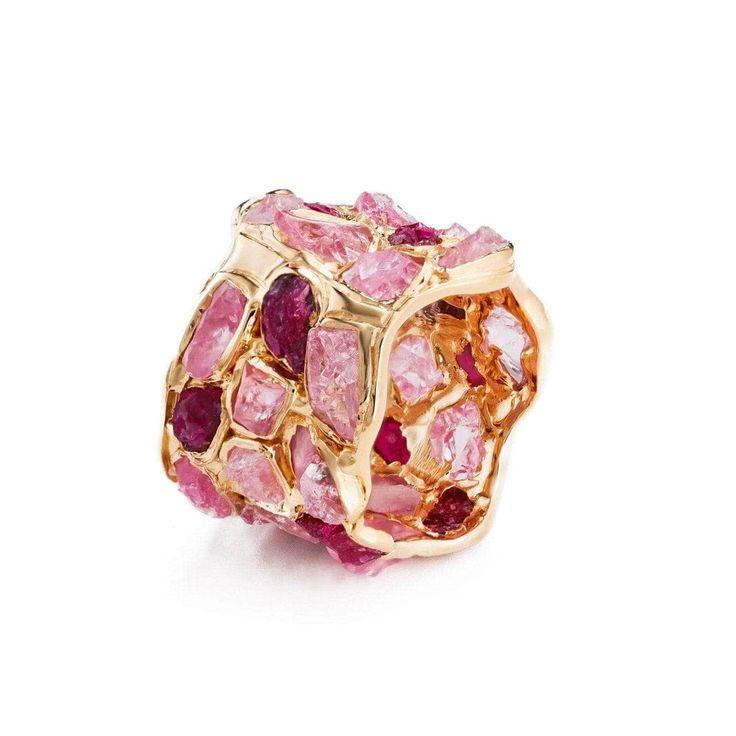 A barrel ring encrusted with brilliantly sparkling gemstones that have a truly opulent glow. They are encased in a setting of pure silver that is truly radiant in its shine and lusture. Silver 925 Stones Ruby Rough, Pink Sapphire Rough Plating Gold 18K Width 11 mm Band wide 11 mm Length 23 mm Weight 8.04 g Barrel Ring, Barrel Rings, Pink Sapphire Ring, Citrine Ring, Gorgeous Jewelry, Dream Jewelry, Perfect Ring, Pink Sapphire, Pure Silver