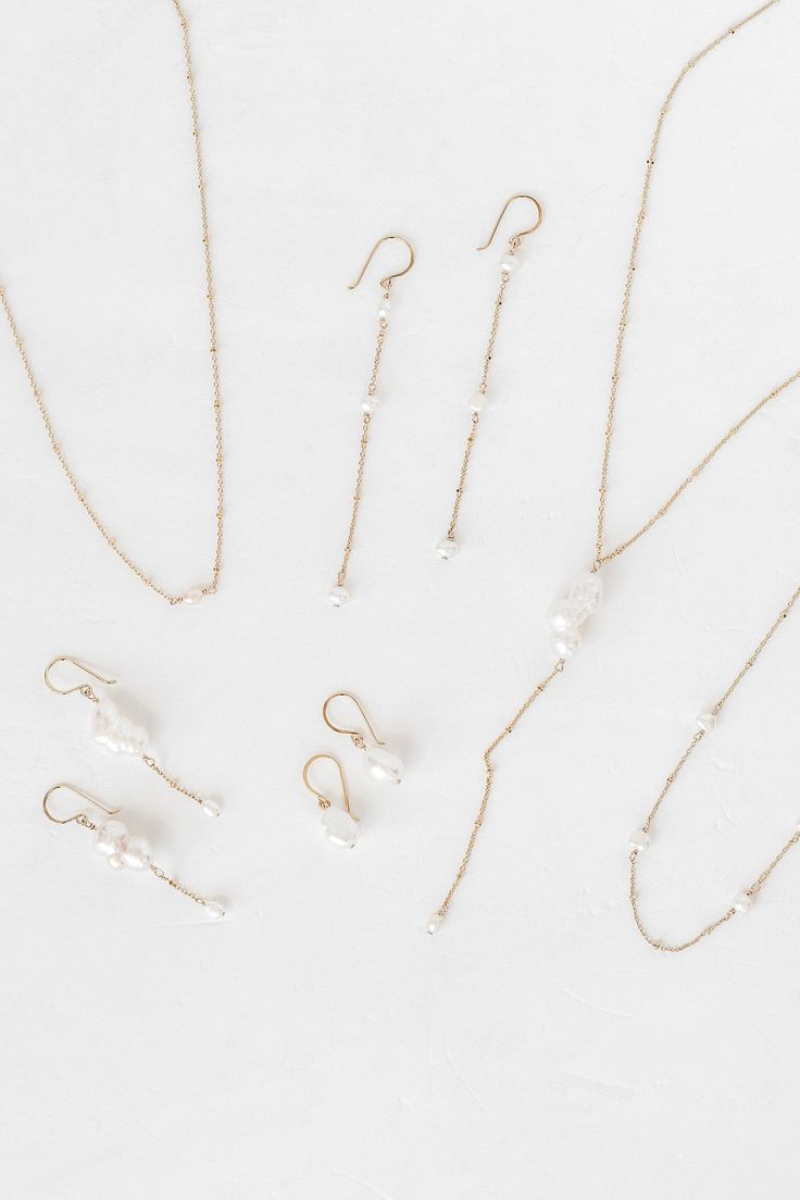 Inspired by the dreamy feeling of looking up into the clouds, the Cloud Collection reimagines historical jewelry elements resulting in timeless, airy, and whimsical jewelry that will have you floating on cloud nine. A freshwater pearl is not mined and shaped. It is born complete and lovely, beneath the water. Baroque pearls are especially "wabi sabi," beautiful in their asymmetry and each one of a kind. ﻿- 6mm freshwater pearls﻿- 18k Vermeil ﻿- 15.5" long Cloud Rain, Rain Earrings, Cloud Necklace, Cleaning Stone, Duster Earrings, Love Mail, Hanging Necklaces, On Cloud Nine, Whimsical Jewelry