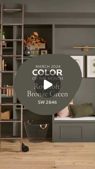 a living room with gray walls and wooden flooring is featured in the march color of the month