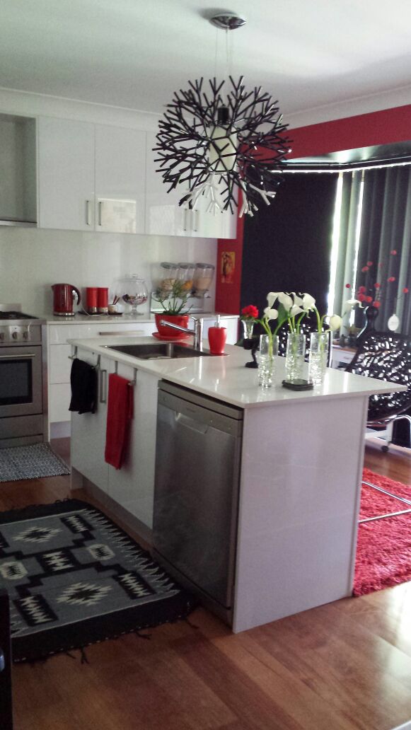 the kitchen is clean and ready for us to use in its new owner's home