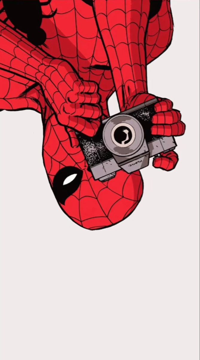 a spider man holding a camera in his hand