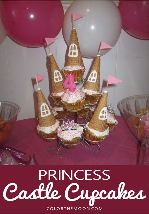 princess castle cupcakes on a table with balloons