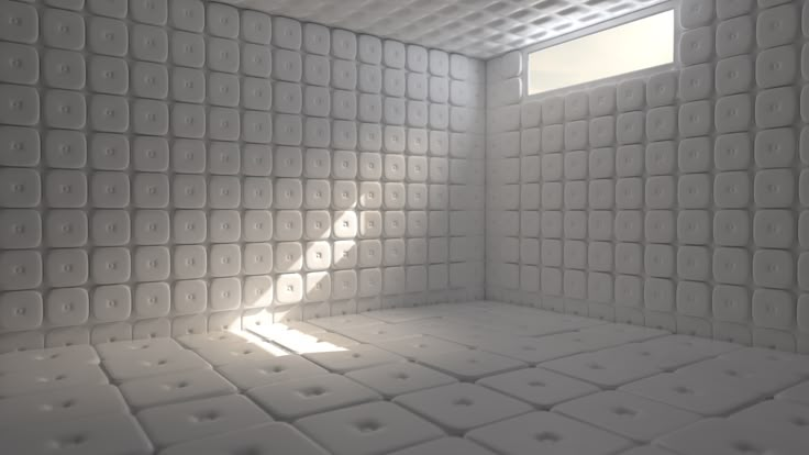 an empty room with white tiles on the walls and windows in the ceiling, as well as sunlight coming through the window