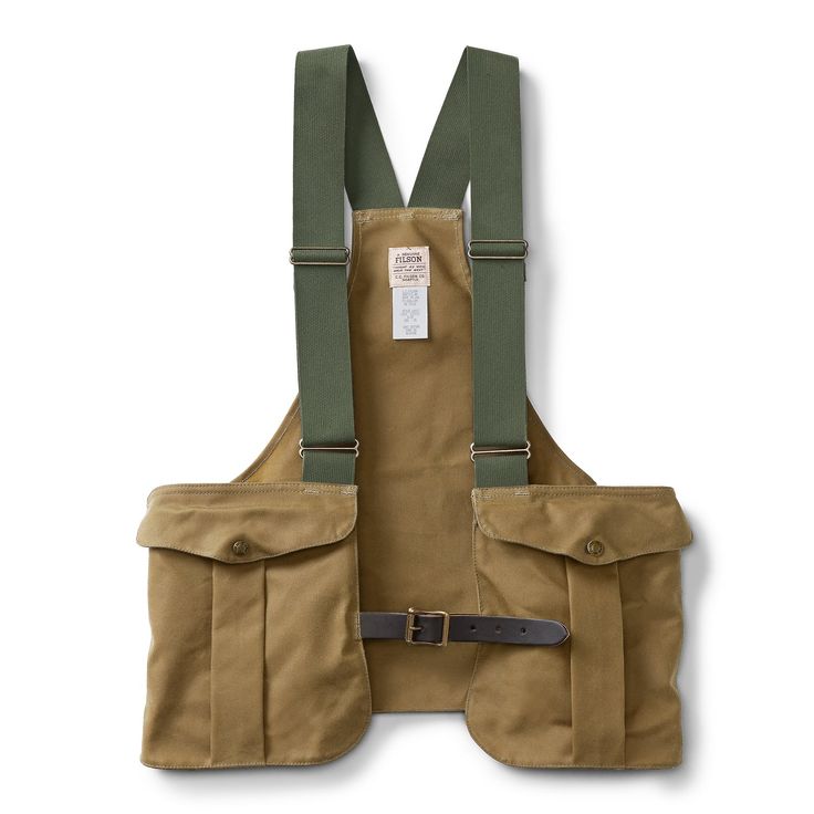 This water-repellent, abrasion-resistant vest with rear game bag is cut for freedom of movement, with adjustable cotton webbing shoulder straps and expandable shell pockets in front. Bridle Leather waist strap with roller buckle closure for adjustable fit. Old Fashioned Games, Hunting Vest, Pocket Vest, Mens Fashion Rugged, Bag Dark, Dark Tan, Waxed Canvas, Sochi, Hunting Fishing