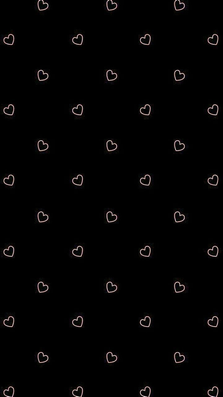 a black background with white hearts on it