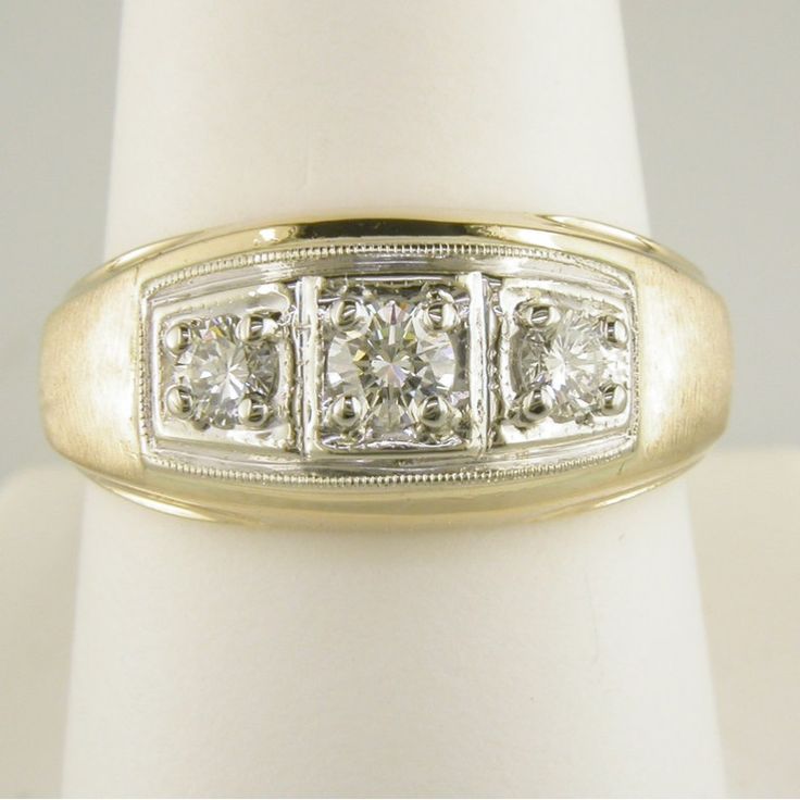 This Men's Ring Holds .50ctw Of G-H Color Si Clarity Natural Diamonds Set In A 2 Toned 14k Gold Mounting. Three Stone Diamond Ring In 14k Silver Gold, 14k Gold Diamond Ring With Three Stones, 14k Gold Three Stone Diamond Ring, Classic Diamond White 14k Stamped Signet Ring, White Diamond Accented Signet Ring For Wedding, White Signet Ring With Diamond Accents For Wedding, Classic White Signet Ring With Single Cut Diamonds, 14k White Gold Signet Ring For Anniversary, Classic White Gold Signet Ring For Wedding