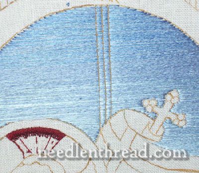 the embroidery pattern shows an image of a woman laying down