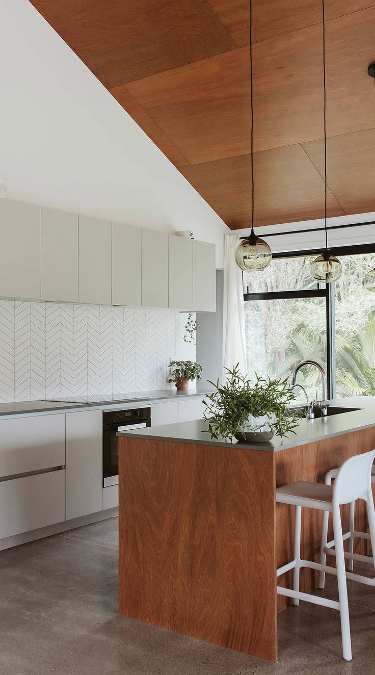 the kitchen is clean and ready to be used as a dining room or office space