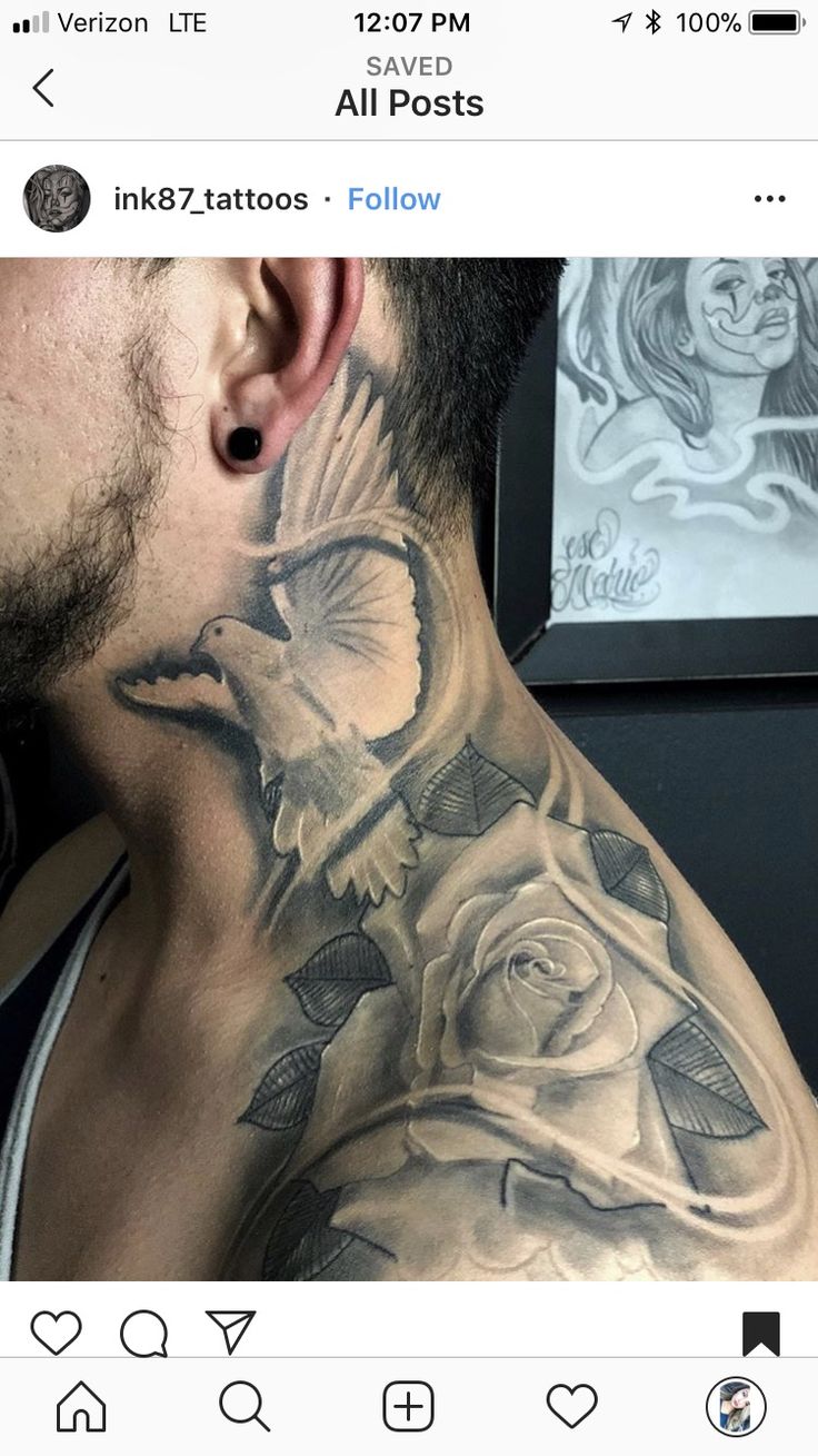 a man's neck is covered in tattoos and has a bird on top of the rose