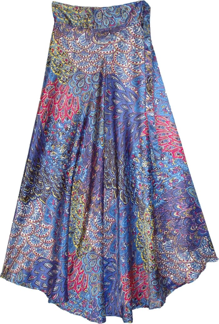 A beautifully adorned wrap-around skirt that looks one of a kind, especially with its kaleidoscope-like all-over pattern.  This shiny, soft, and smooth faux satin skirt is versatile and comfortable. #tlb #WrapAroundSkirt #HighLow #vacationclothing #Dance #Floral #Printed #Wraparoundfloralskirt #wrapskirtforsummer #silkyskirt Multicolor Flowy Asymmetrical Skirt, Festive Long Silk Skirt, Multicolor Silk Flowy Skirt, Multicolor Flowy Silk Skirt, Festive Silk Flared Skirt, Multicolor Silk Skirt, Multicolor Relaxed Flared Wrap Skirt, Multicolor Tiered Lined Wrap Skirt, Multicolor Tiered Wrap Skirt With Lining