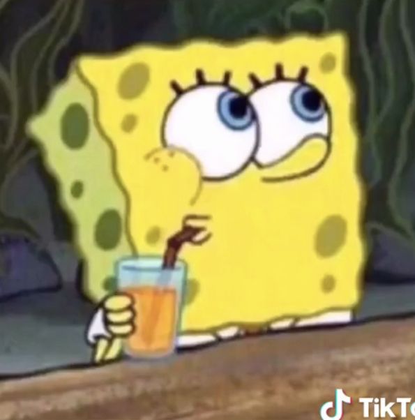 the spongebob is holding a drink in his hand