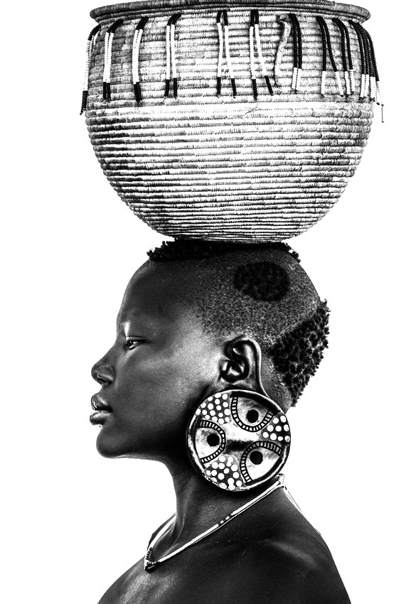 an african woman with a basket on top of her head, black and white photograph