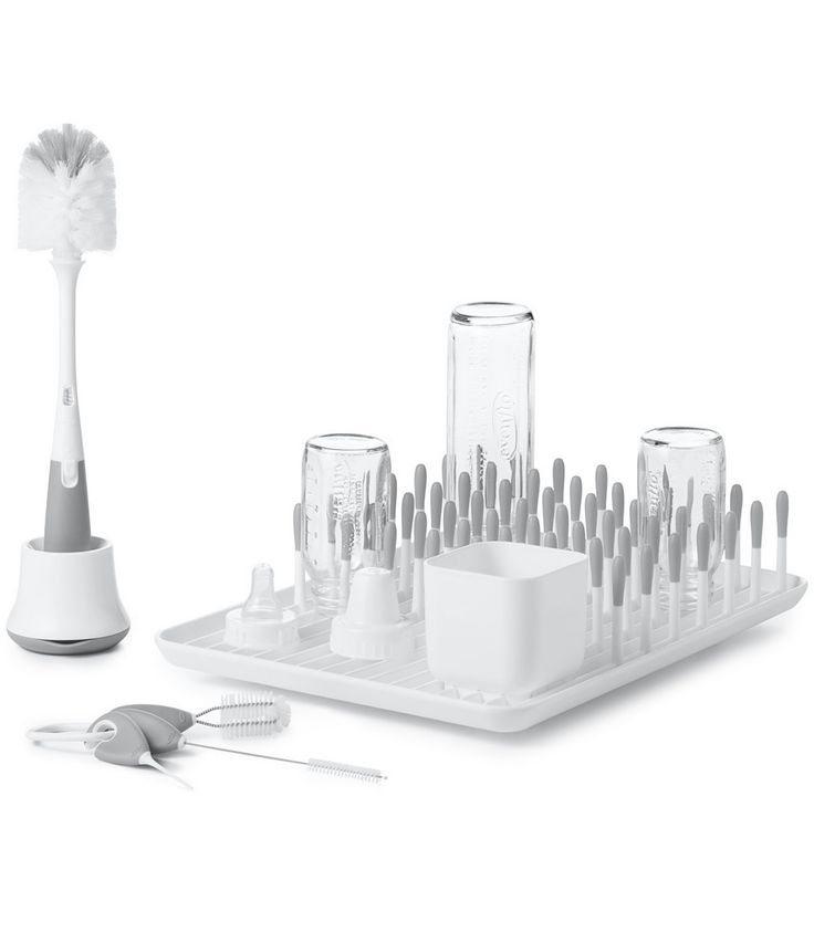 an assortment of toothbrushes and dental floss on a tray