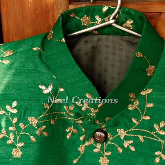 *This is Semi Raw silk Nehru Jacket for men.This is custom made to size and will be made only after you confirm size.We can make matching outfits for family.Please contact us if you want matching outfits.**Buttons and inner lining may differ in color as per availability. * Please note there may be slight color difference due to different screen settings. Traditional Nehru Jacket With Stand Collar For Designer Wear, Sleeveless Nehru Jacket With Zari Work For Wedding, Green Nehru Jacket With Stand Collar For Festive Occasions, Traditional Green Raw Silk Nehru Jacket, Festive Green Raw Silk Nehru Jacket, Festival Embroidered Brocade Nehru Jacket, Silk Nehru Jacket With Cutdana For Wedding, Traditional Sleeveless Bandhgala With Zari Work, Traditional Nehru Jacket With Stand Collar For Festive Occasions