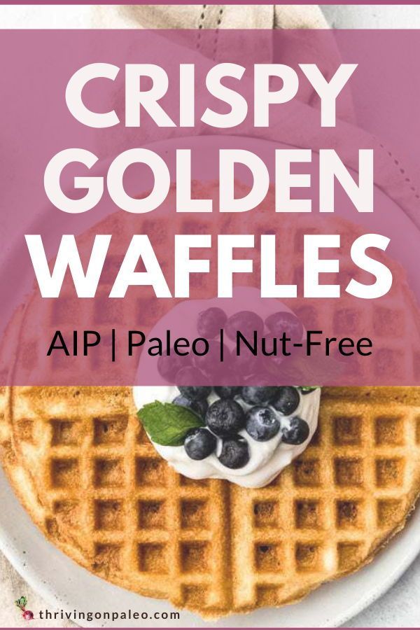 crispy golden waffles with blueberries on top and the words, crispy golden waffles