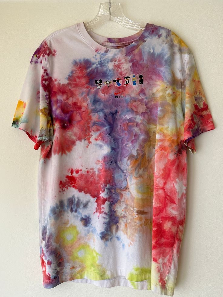 Super fun soft cotton hand dyed Nike graphic tie-dye t-shirt. This unique tee is a fun addition to your closet or to give us a gift. Fits an oversized Meduim or a standard Large. Multicolor Graffiti Print T-shirt For Summer, Summer Acid Wash T-shirt With Screen Print, Multicolor Graffiti Print Cotton T-shirt, Casual Multicolor Watercolor Print T-shirt, Hippie Multicolor T-shirt For Spring, Fun Summer Festival T-shirt, Multicolor Relaxed Fit T-shirt With Graffiti Print, Trendy Hand Dyed Crew Neck T-shirt, Summer Graffiti Print Relaxed Fit T-shirt