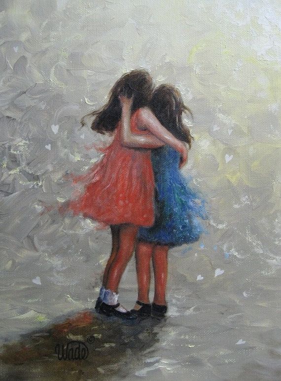 two girls hugging each other while standing in the rain