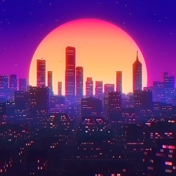 the sun is setting over a city with tall buildings