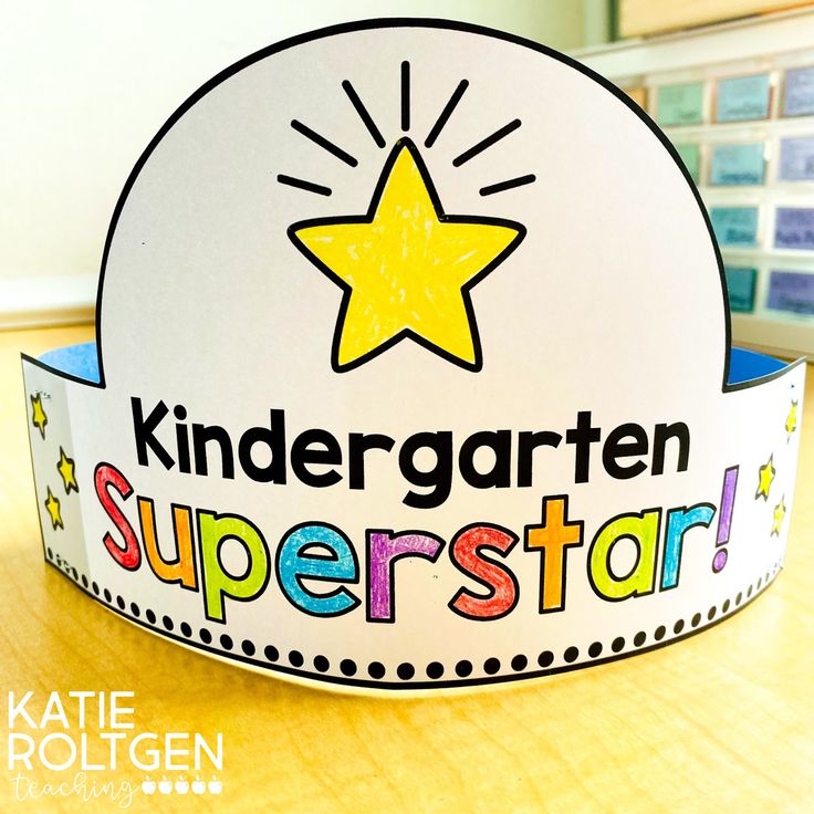 a paper hat with the words kindergartn superstar on it and a yellow star