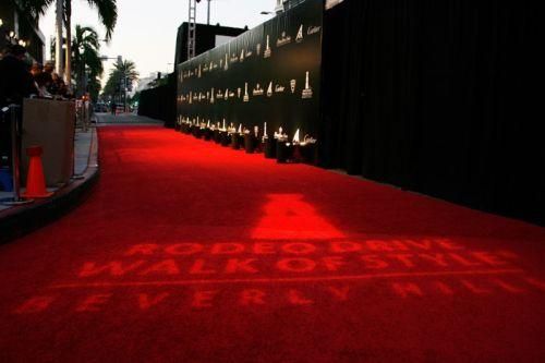 the red carpet at the hollywood walk of fame ceremony is lit up with white lights