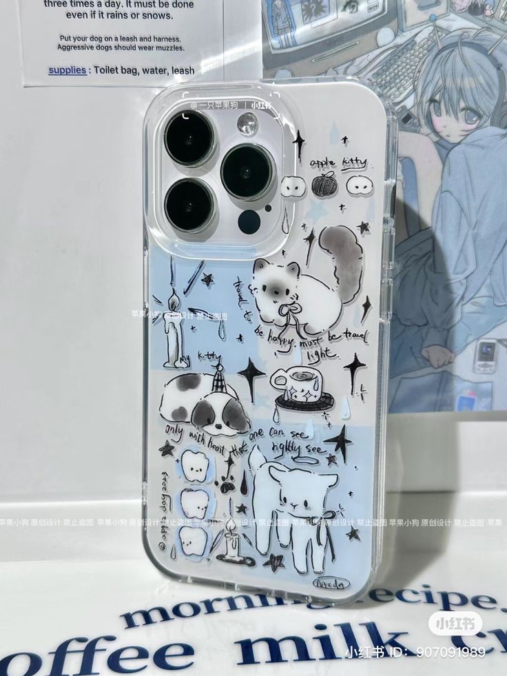 an iphone case with drawings on it sitting in front of a sign that says coffee milk