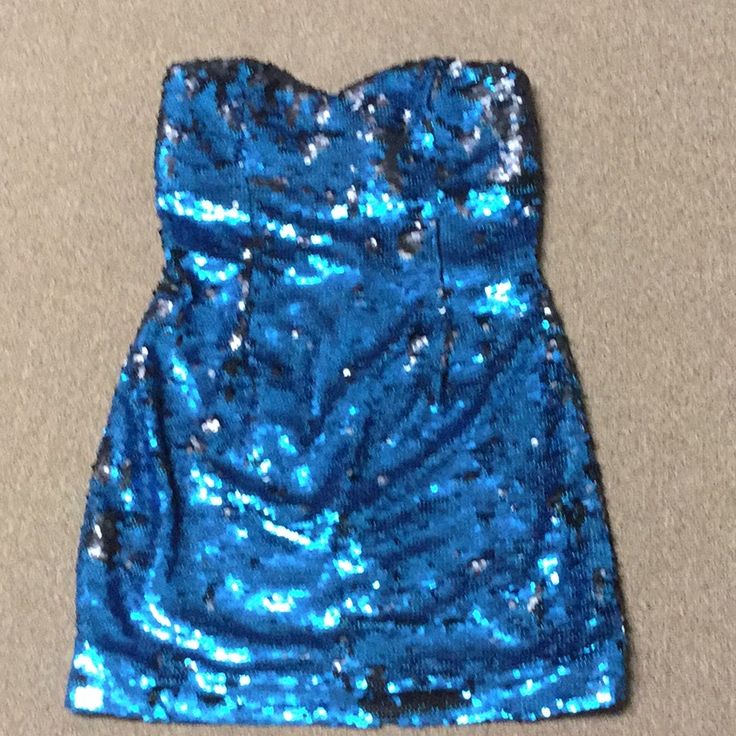 Beautiful Sequin Party Dress. Black Or Blue! Depends On Which Way You Smooth The Sequins, Down Or Up. Never Worn. Fits More Likes 5/6 Juniors Than A 9 Junior. Flirty Strapless Dresses For Costume Party, Blue Summer Dress For Costume Party, Fitted Sleeveless Sequin Dress For Costume Party, Chic Sequined Dress For Costume Party, Blue Mini Dress For Summer Costume Party, Blue Sleeveless Dress For Costume Party, Blue Club Dresses For Party Season, Fitted Mini Dress For Costume Party, Blue Sequin Dress For Night Out In Summer