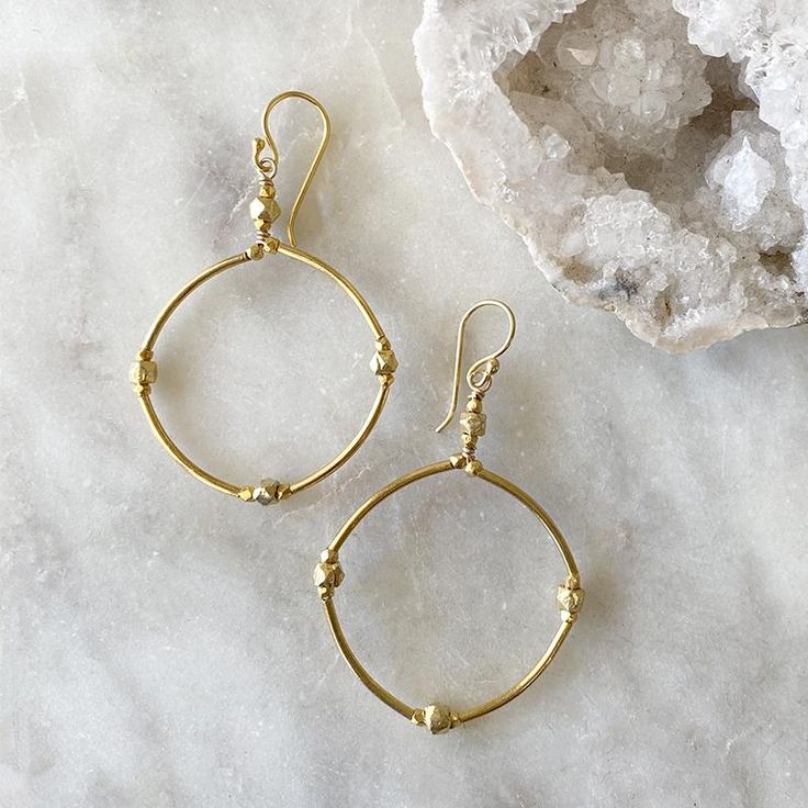 Golden Hoop Earrings Yellow Gold Circle Brass Earrings, Yellow Gold Circle Earrings In Brass, Hammered Yellow Gold Dangle Hoop Earrings, Gold Open Circle Hoop Earrings, Artisan Yellow Gold Round Earrings, Yellow Gold Dangle Hoop Earrings With Hammered Texture, Yellow Gold Hammered Dangle Hoop Earrings, Classic Handmade Gold Hoop Earrings, Handmade Classic Gold Hoop Earrings