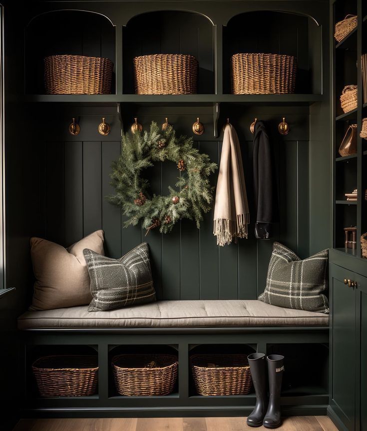 the entryway is decorated with christmas wreaths and other holiday decorations, along with baskets