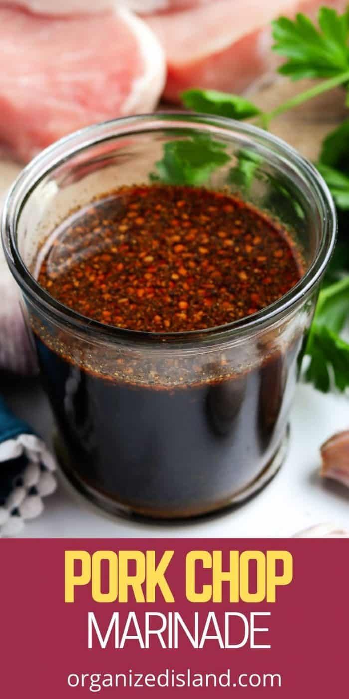 pork chop marinade in a glass bowl with parsley on the side and text overlay